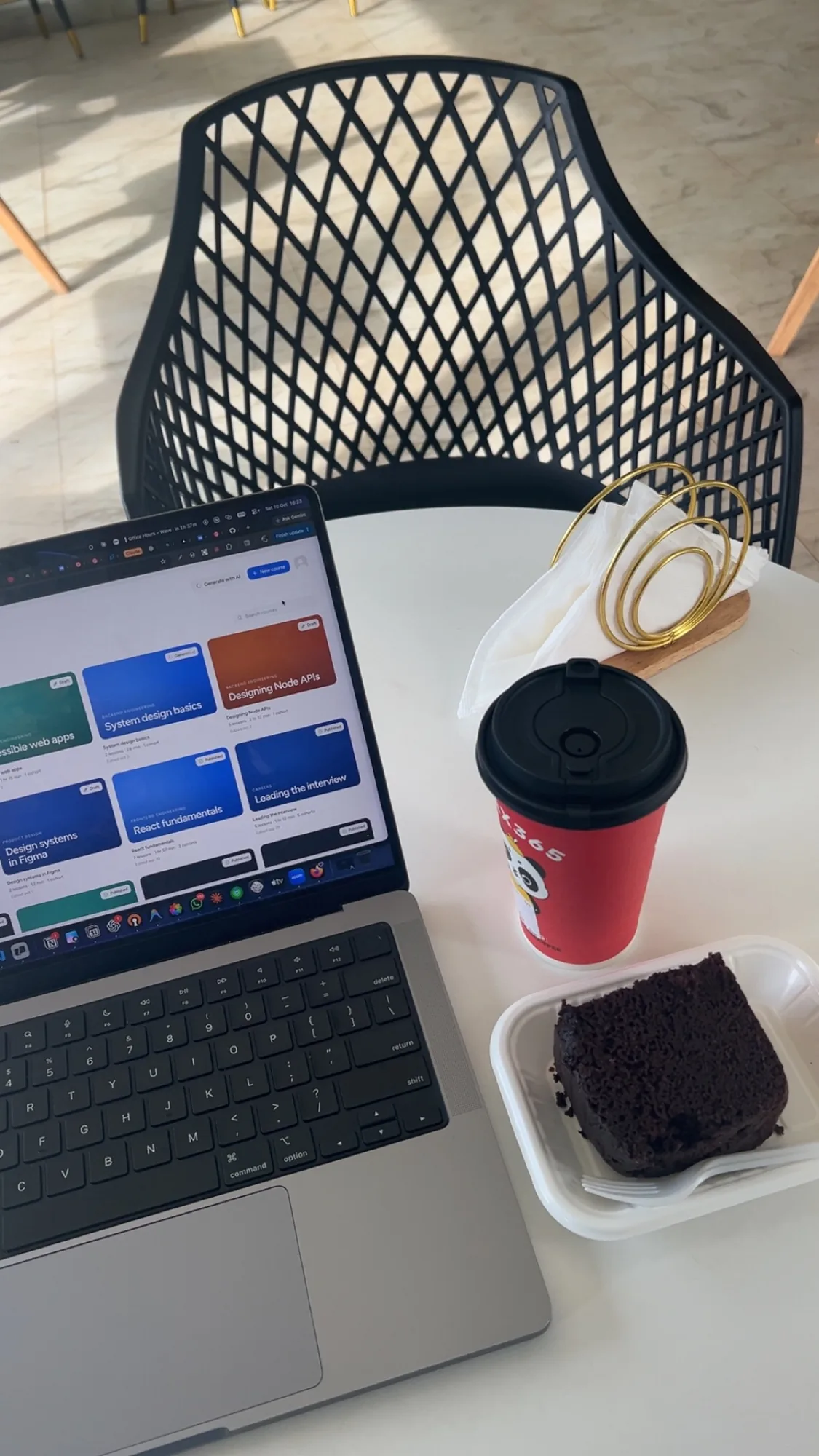 Coffee, chocolate cake and Grasp open on my laptop